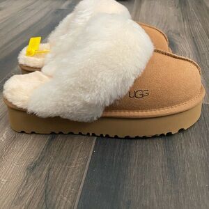 New size 7 Ugg slippers. Do not have box